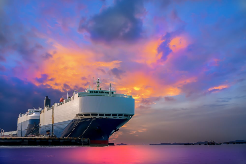 Two NYK RoRo vessels docked at sunset
