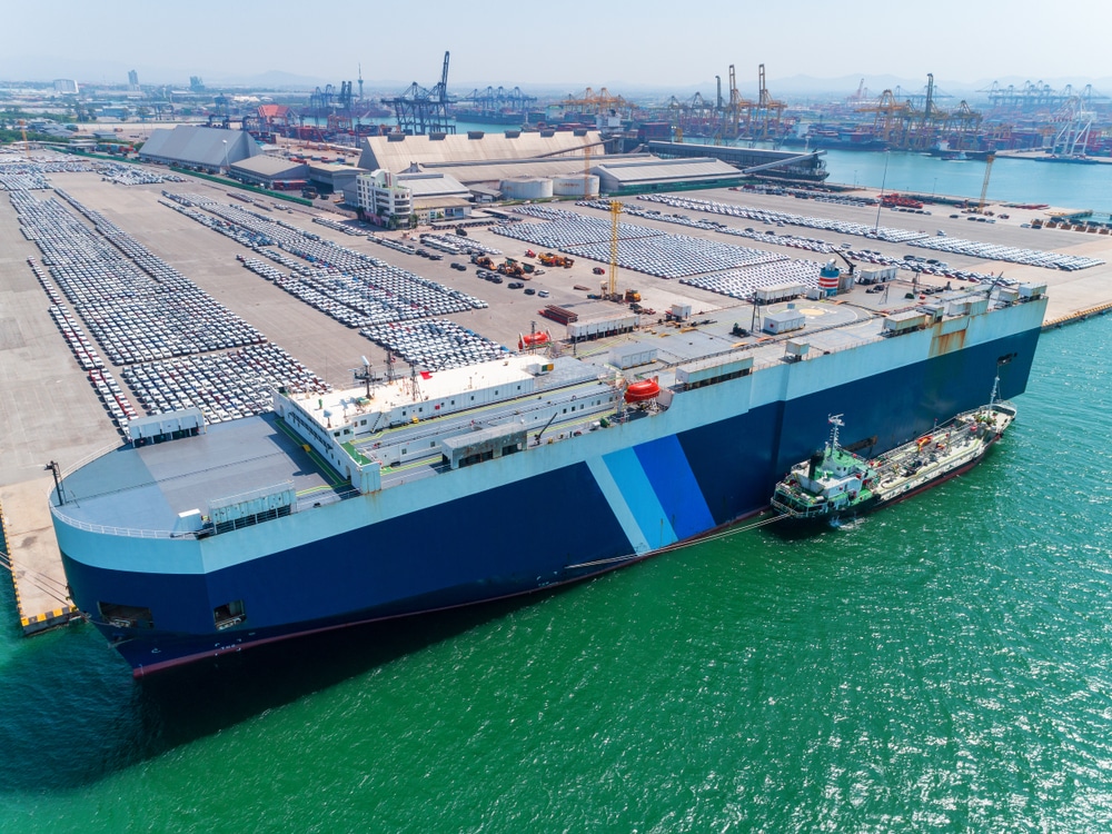 NYK RoRo docking with tugboat assistance