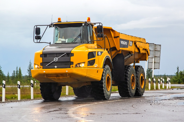 Six-wheel dump truck at work site
