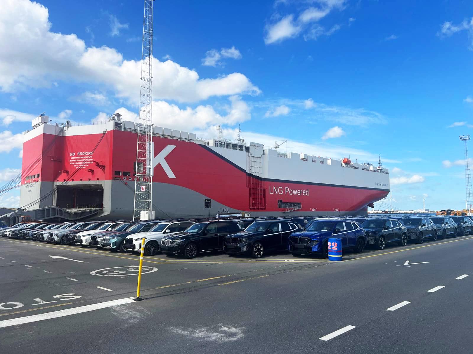 LNG-powered cargo ship 'Wild Rose' docked at Zeebrugge port with vehicles ready for export in 2025